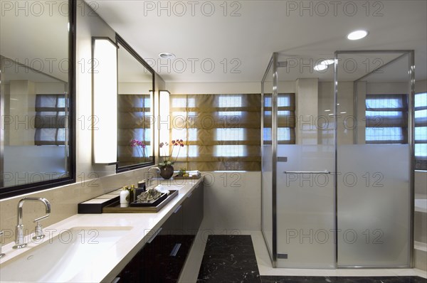 Modern bathroom with large glass shower