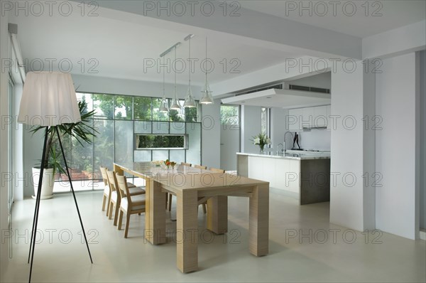 Wooden dining table in modern interior