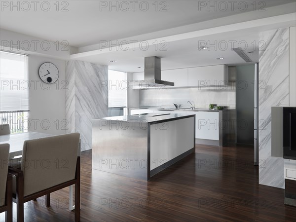 Modern Kitchen and dining room with stainless steel kitchen island