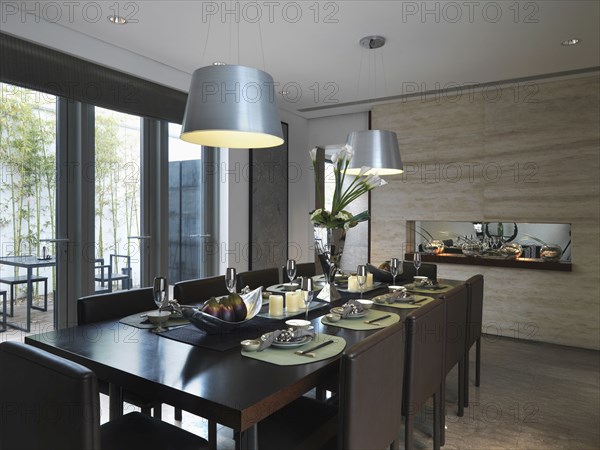 Elegant dining room table with place settings