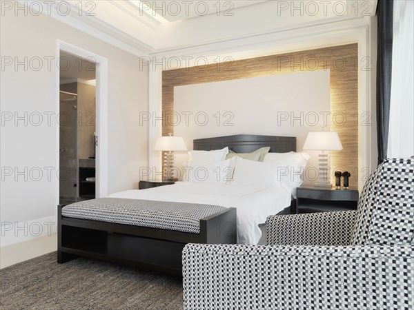 Black and white furniture in modern bedroom