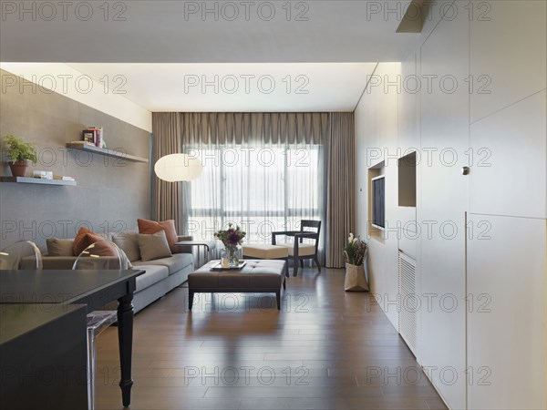 Modern living room and dining room with hardwood floors