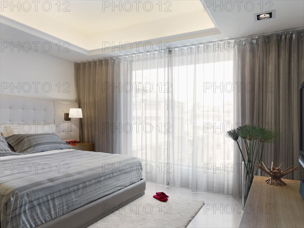 Large bed in modern bedroom