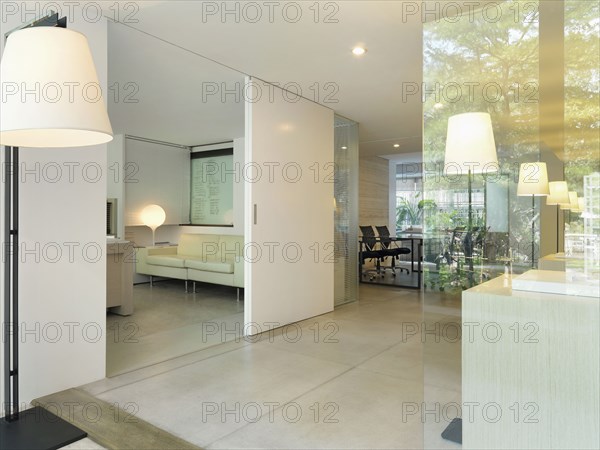 Sliding doors to private office in modern office building