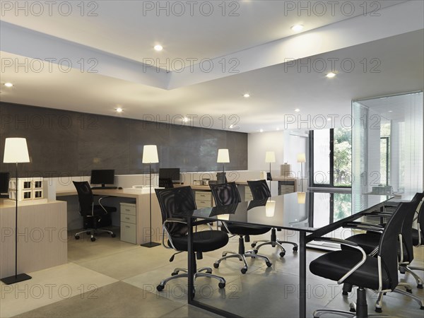 Workspaces and conference table in modern office
