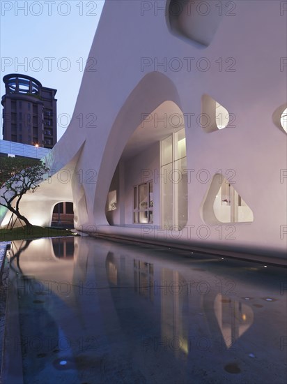 Exterior white modern building at dusk