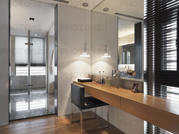 Long wooden vanity in modern home