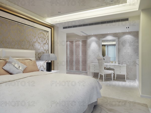 Elegant bedroom with printed wall paper