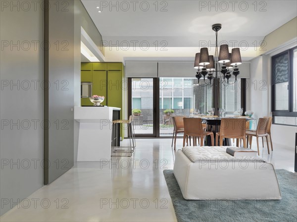 Kitchen breakfast bar and dining room in modern home