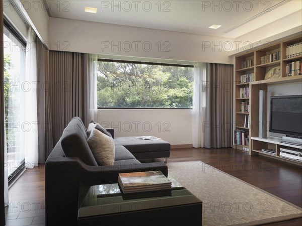 Living room with entertainment center in home