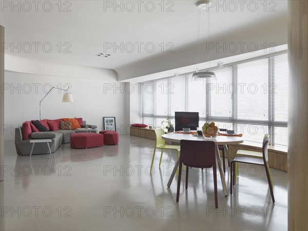 Dining room and living room in ultra modern home