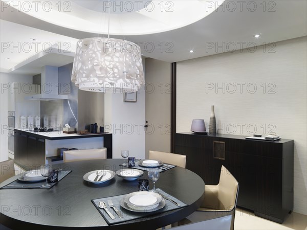 Circular dining table in modern home