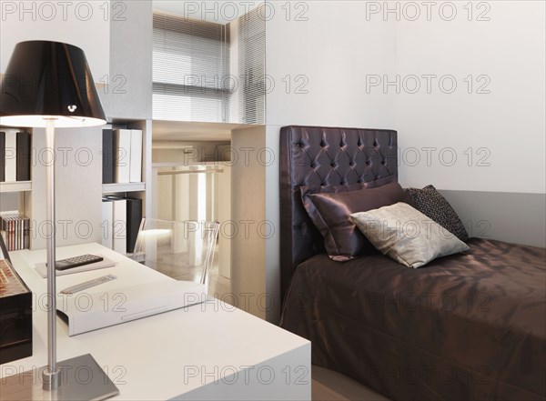 Small modern bedroom with desk