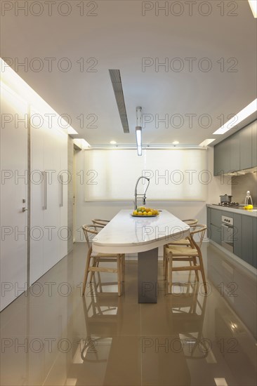 Dining table in kitchen in modern home