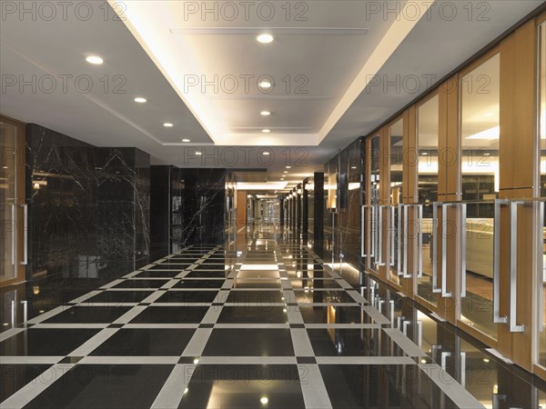 Grand foyer with patterned tile in apartment building lobby