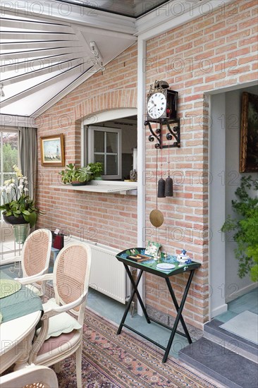 Brick wall in traditional dining room