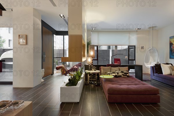 Large and spacious living room with windows at a contemporary home