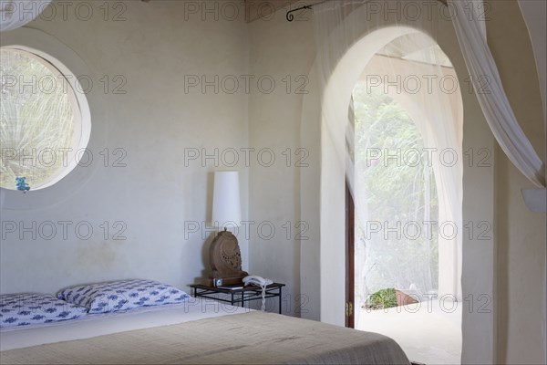 Bed and side table in bedroom