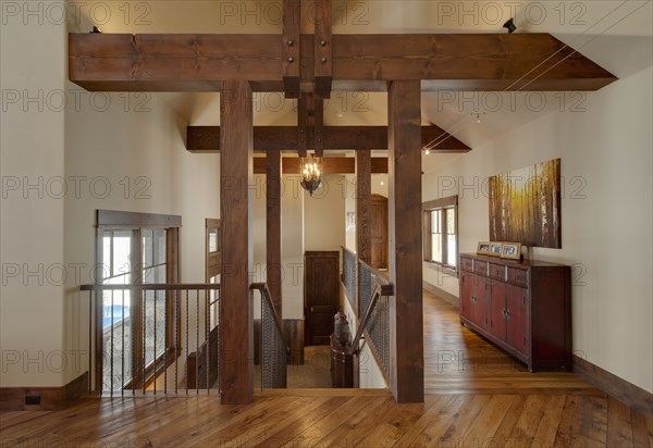 Side board by staircase in house