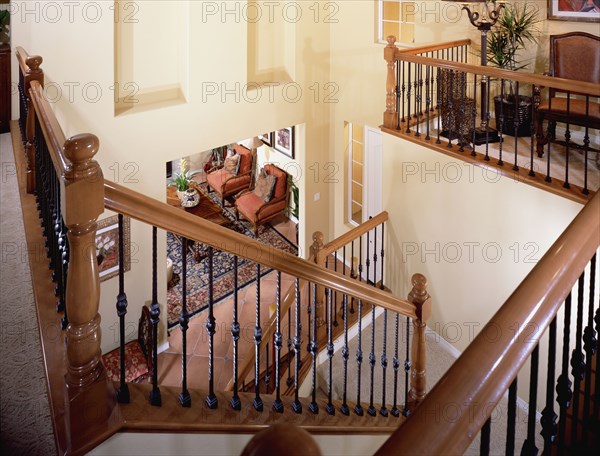 High angle u shaped staircase with railing