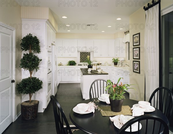 White kitchen with dining area