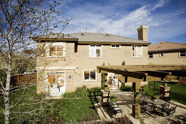 Rear Exterior of Home with Large Terrace Patio