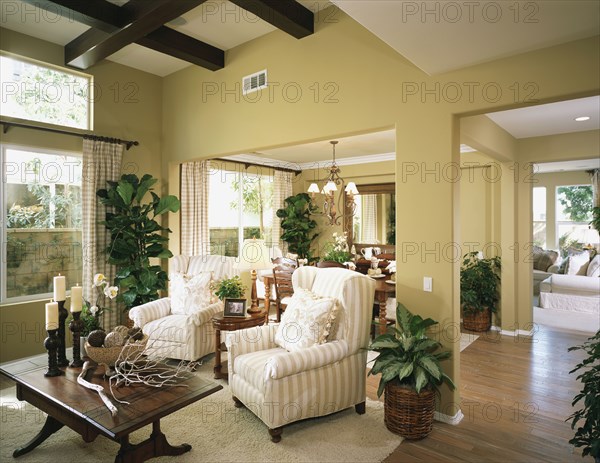 Cozy sitting area with striped arm chairs