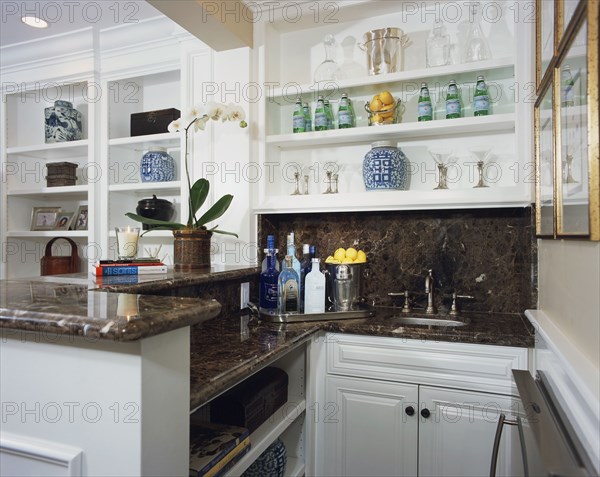 Small wet bar with granite countertops