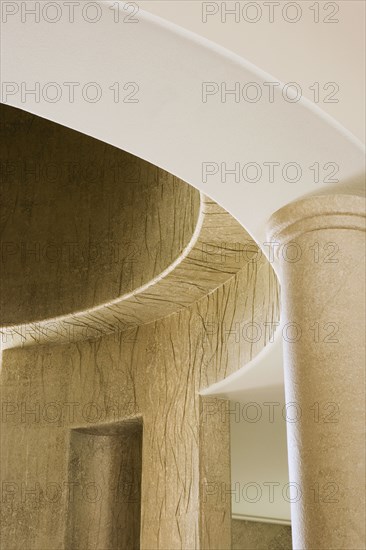 Architectural Detail of Ornate Gold Walls and Columns