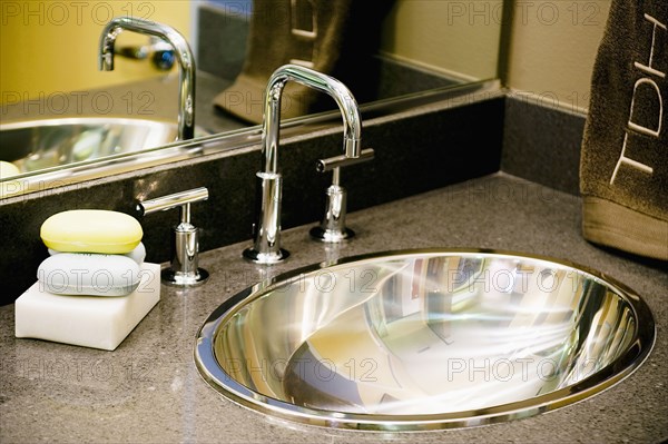 Detail of Metal Bathroom Sink and Faucet