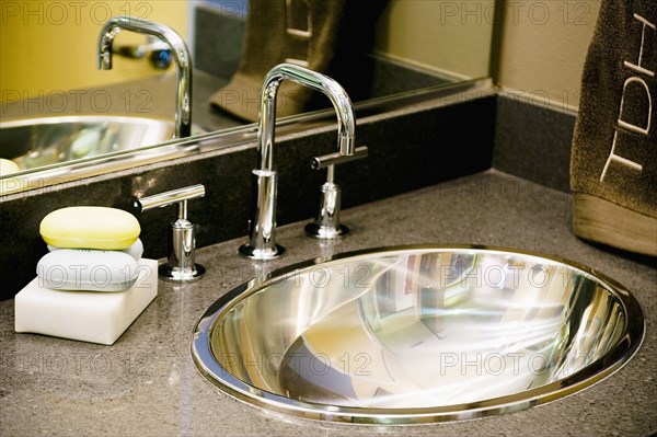 Detail of Metal Bathroom Sink and Faucet