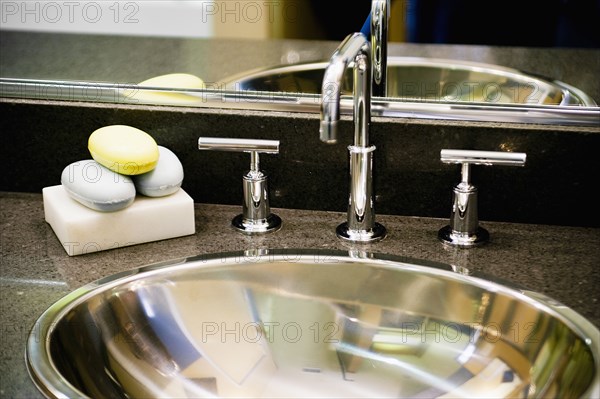 Detail of Metal Bathroom Sink and Faucet