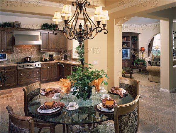 Circular dining table in traditional kitchen