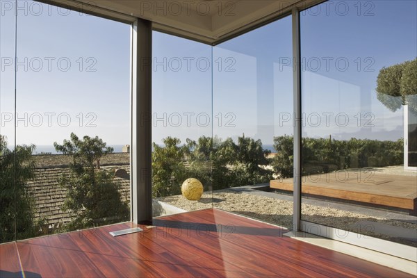 Large Windows and Hardwood Floor
