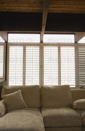 Plantation Shutters over Sofa