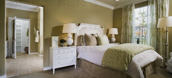 Contemporary bedroom with crown molding