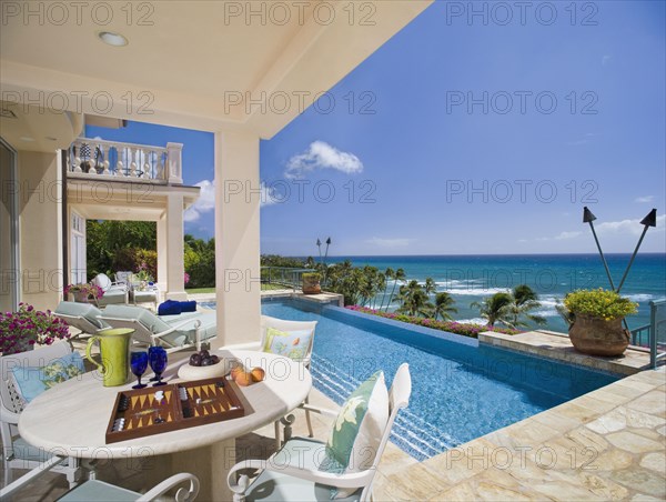 Large Swimming Pool and Deck in Coastal Mansion