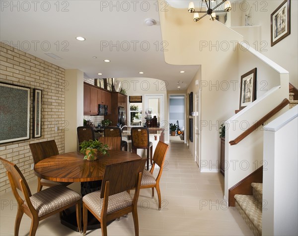 Contemporary Dining Room with Wood Table