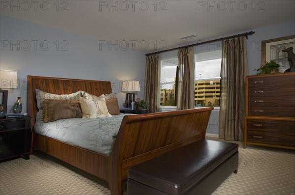 Masculine Blue Bedroom with Large Sleigh Bed