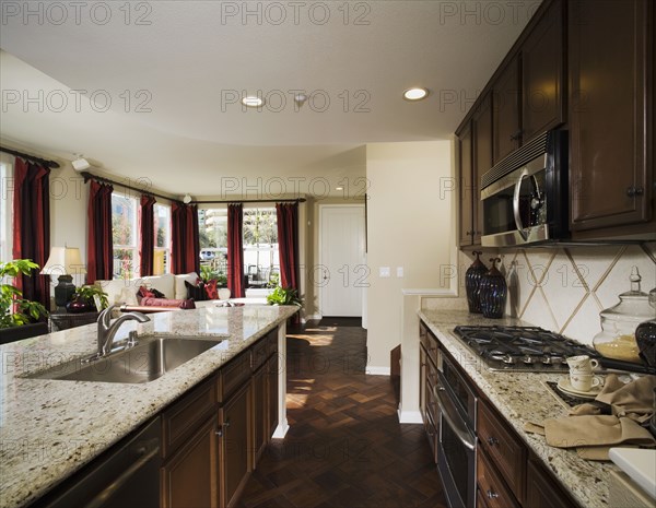 Traditional kitchen with parquet wood flooring