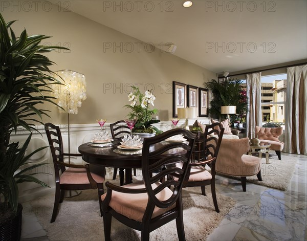 Elegant sitting and dining area with marble floor