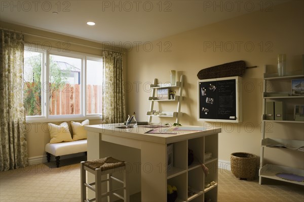 Craft room with Built In Craft Table and Shelves