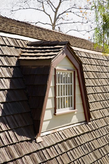 Exterior Shot of Traditional Home with Red Trim