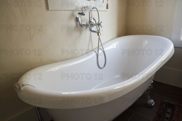 Spanish Style Claw Foot Tub and Chrome Faucet