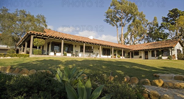 Exterior of Spanish Style Home and Landscape