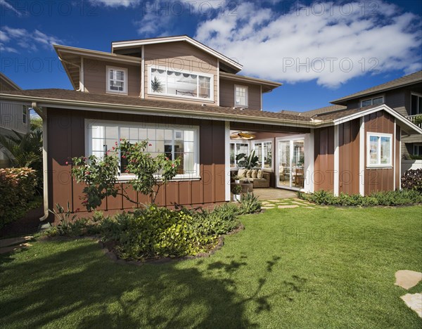 Rear Exterior of Red Traditional Home