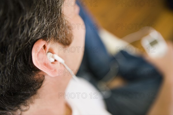 Man Listening to MP3 Player