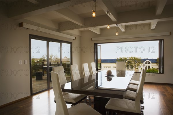 Modern Dining Room with Reflective Table