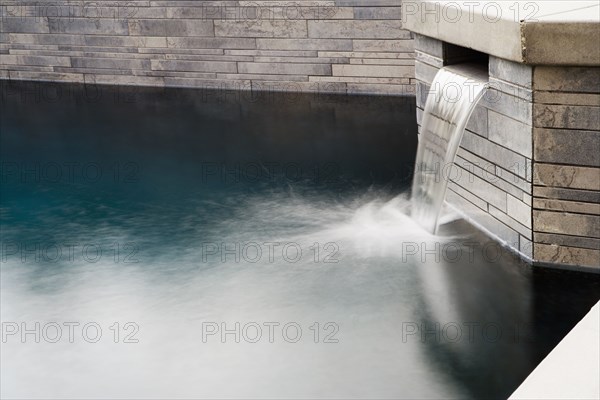 Waterfall from Stone hot tub to Swimming Pool