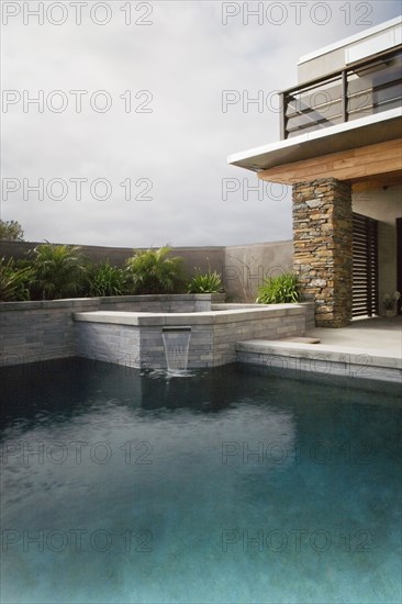 Rear Exterior of Modern Home and Swimming Pool